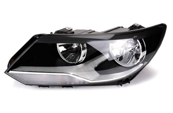 VW Headlight Assembly - Driver Side (Halogen) 5N0941005C - Hella 010749251